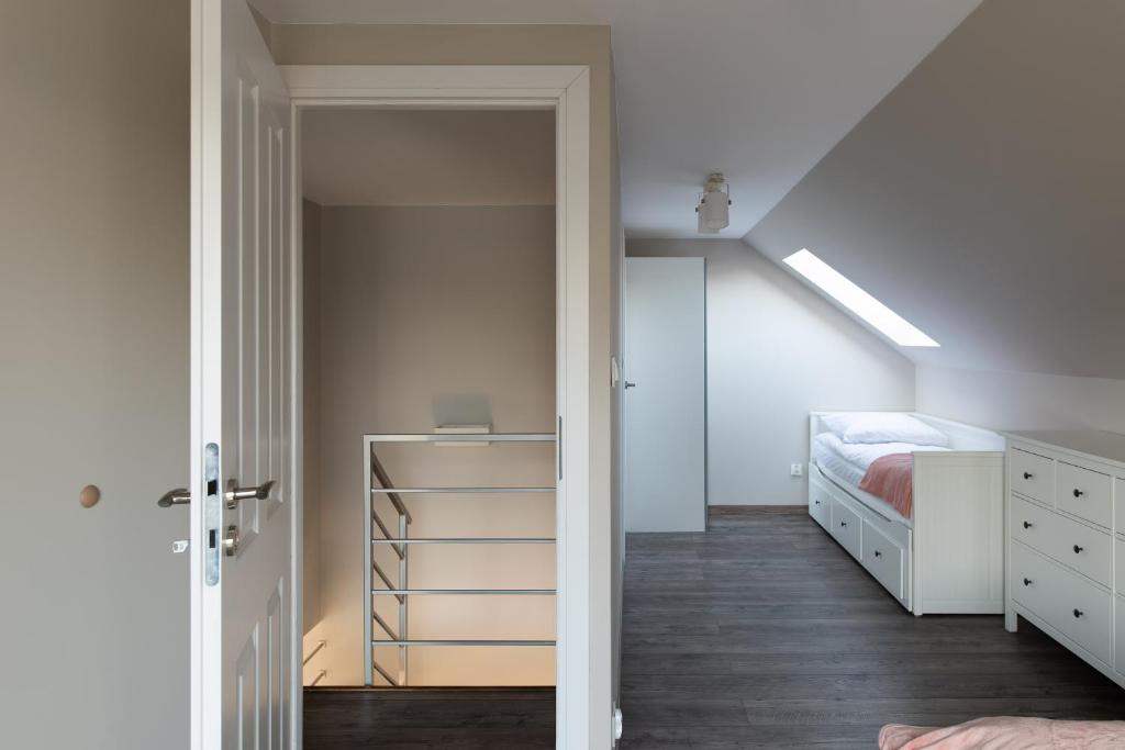 Posteľ alebo postele v izbe v ubytovaní Apartamenty.in Jastrzębia Góra