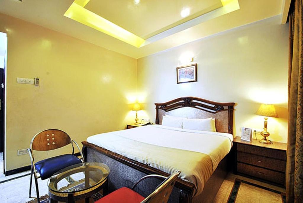 Postel nebo postele na pokoji v ubytování Hotel Zeeras