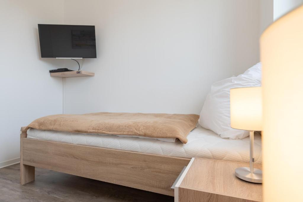Postel nebo postele na pokoji v ubytování Haus Baltic Cube