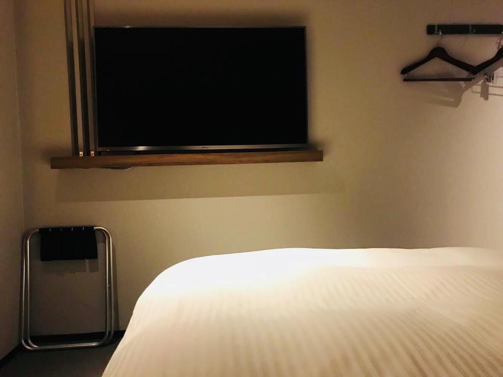 Postel nebo postele na pokoji v ubytování BRENZA HOTEL