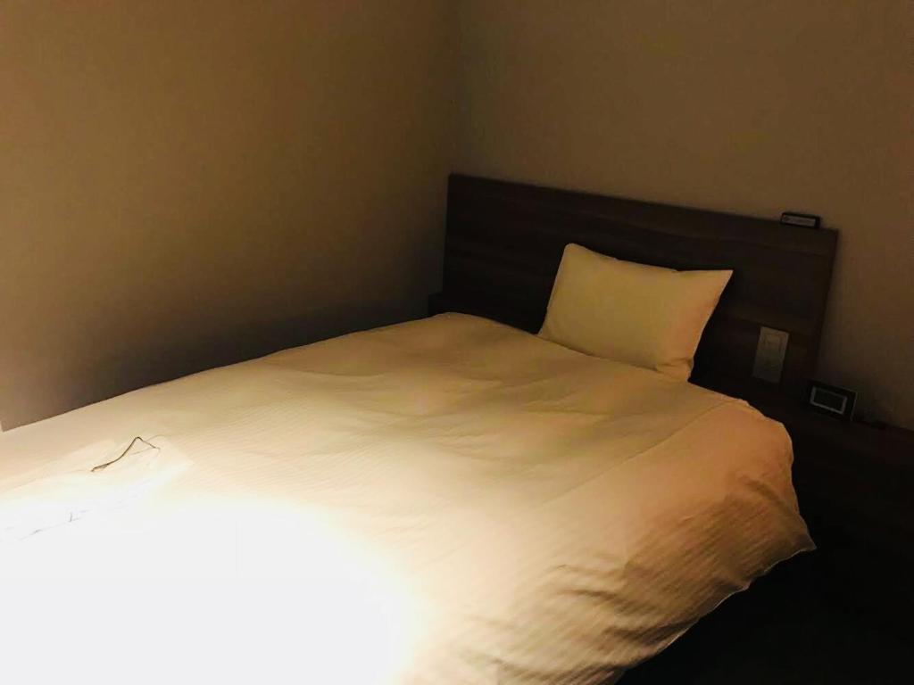 Postel nebo postele na pokoji v ubytování BRENZA HOTEL
