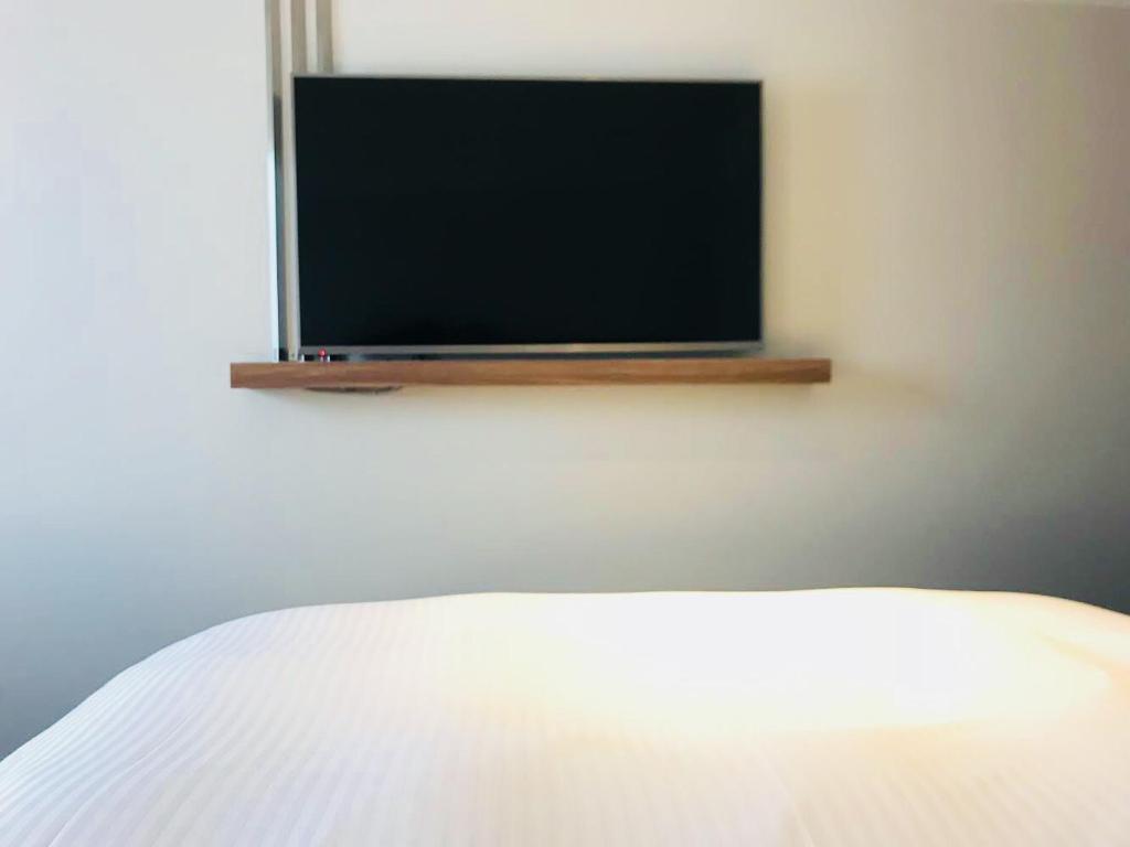 TV a/nebo společenská místnost v ubytování BRENZA HOTEL