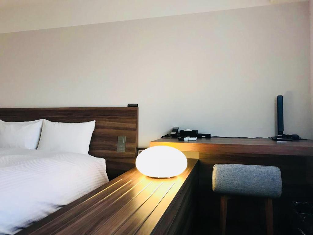 Postel nebo postele na pokoji v ubytování BRENZA HOTEL