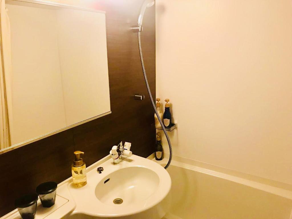 Koupelna v ubytování BRENZA HOTEL