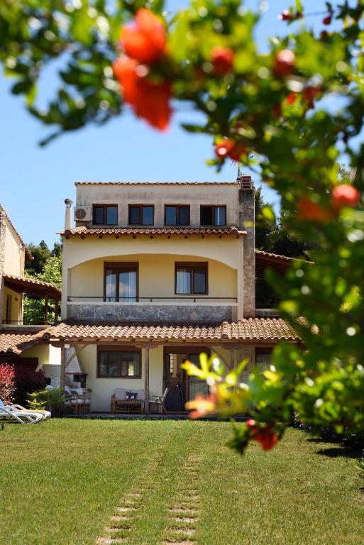 Zahrada ubytování Sani Beach Villa