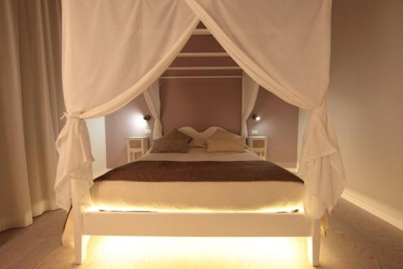 A bed or beds in a room at San Marco White Apartment