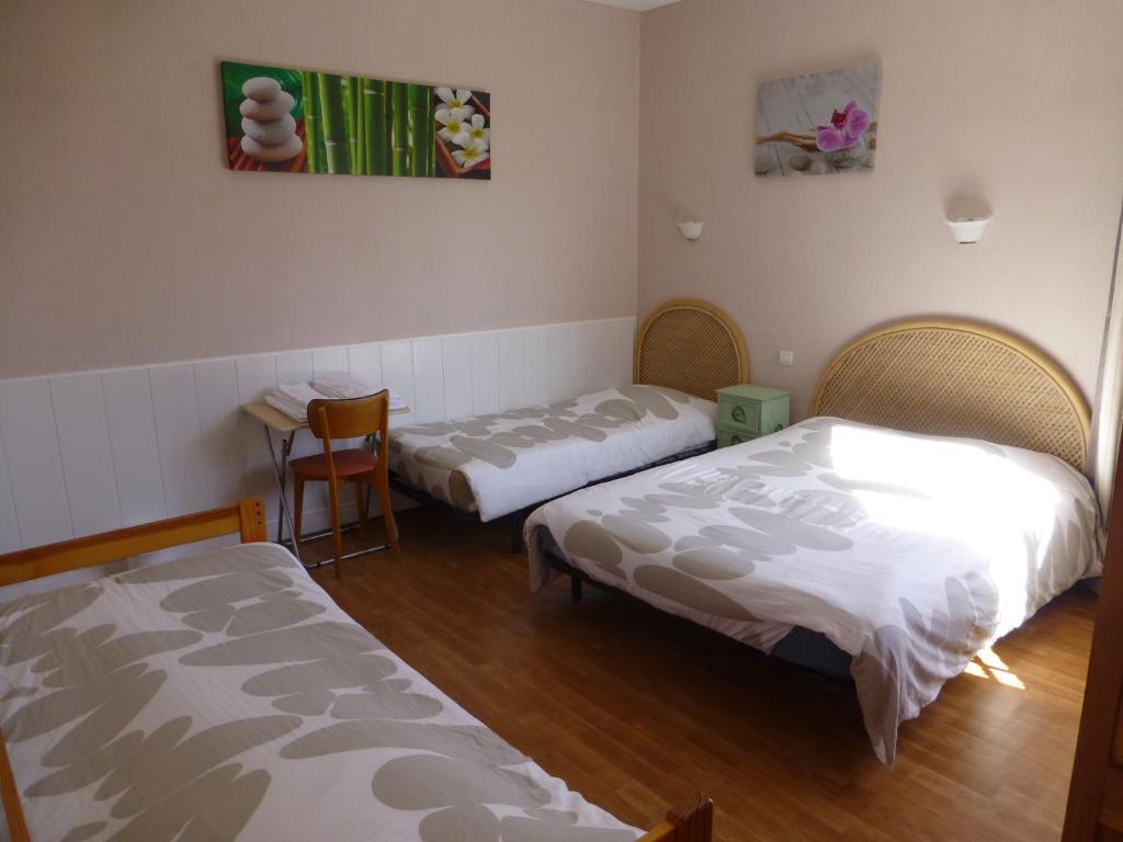 Katil atau katil-katil dalam bilik di Le Narval