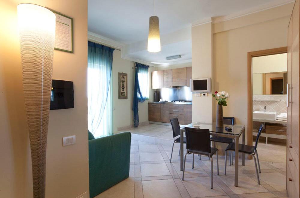 Kuchyň nebo kuchyňský kout v ubytování Posidonia Residence