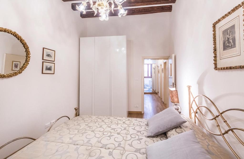 Łóżko lub łóżka w pokoju w obiekcie CASA DEGLI ANGELI, free wi-fi near San Marco