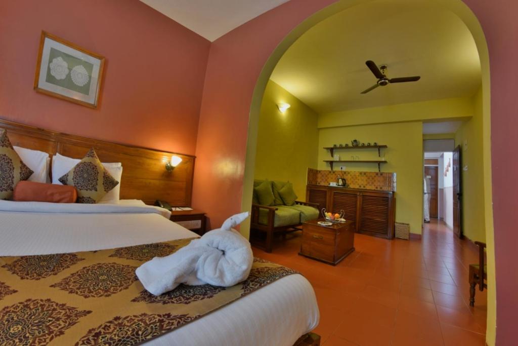 Postel nebo postele na pokoji v ubytování Pride Sun Village Resort & Spa