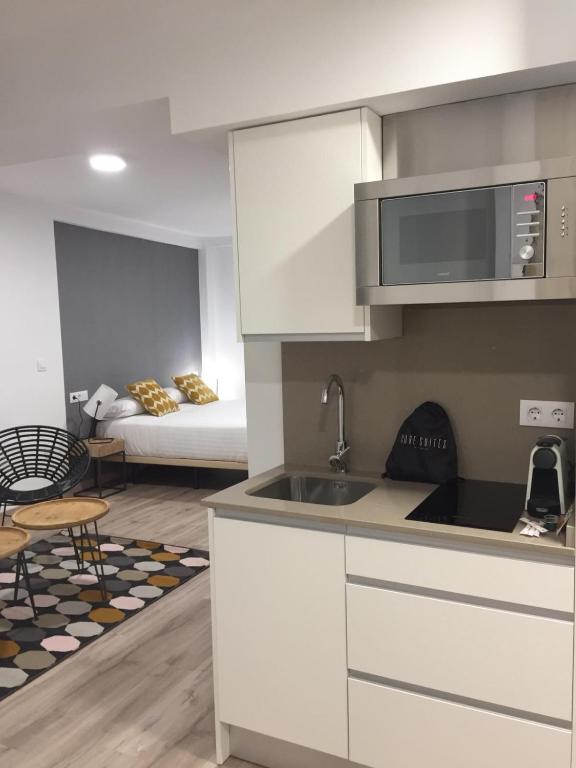 Kuchyň nebo kuchyňský kout v ubytování Apartamentos Core Suite Sevilla