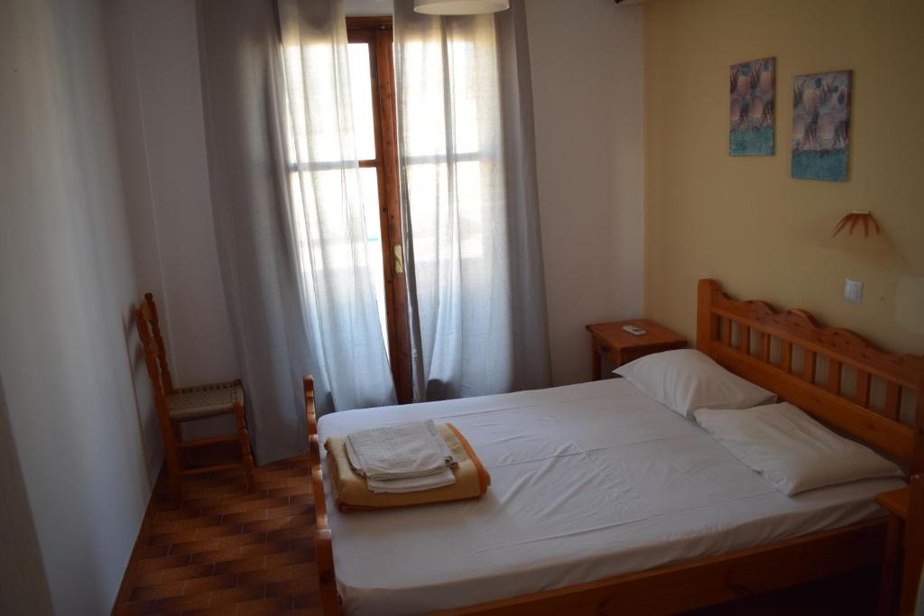 Posteľ alebo postele v izbe v ubytovaní Aratos Hotel