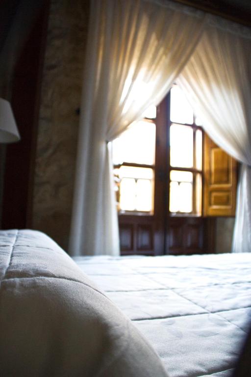 Postel nebo postele na pokoji v ubytování Hotel Microtel Placentinos