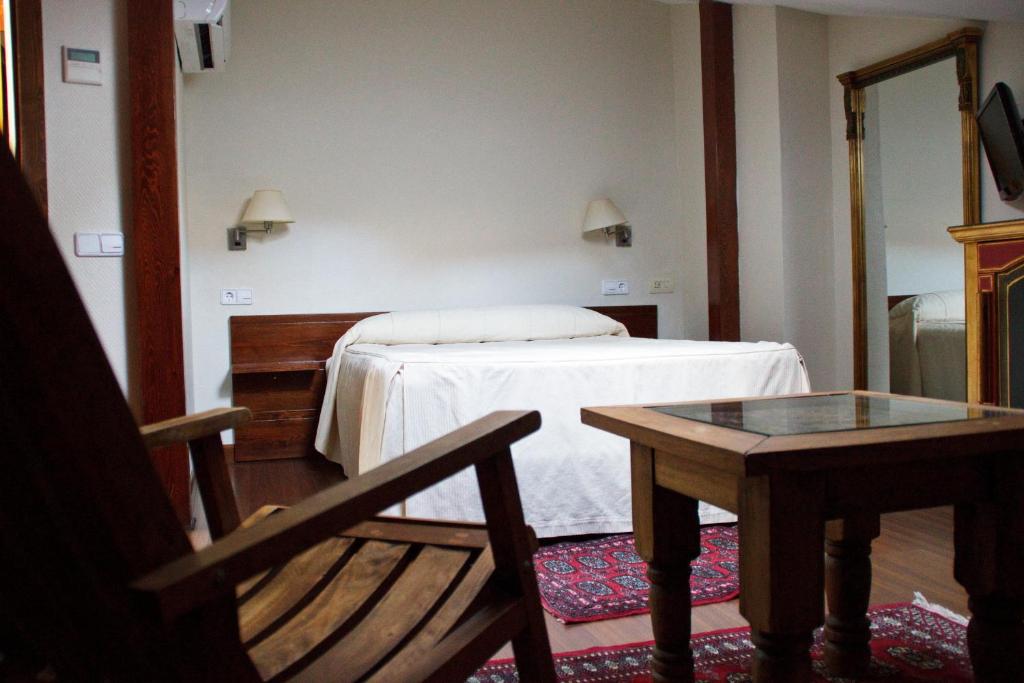Postel nebo postele na pokoji v ubytování Hotel Microtel Placentinos
