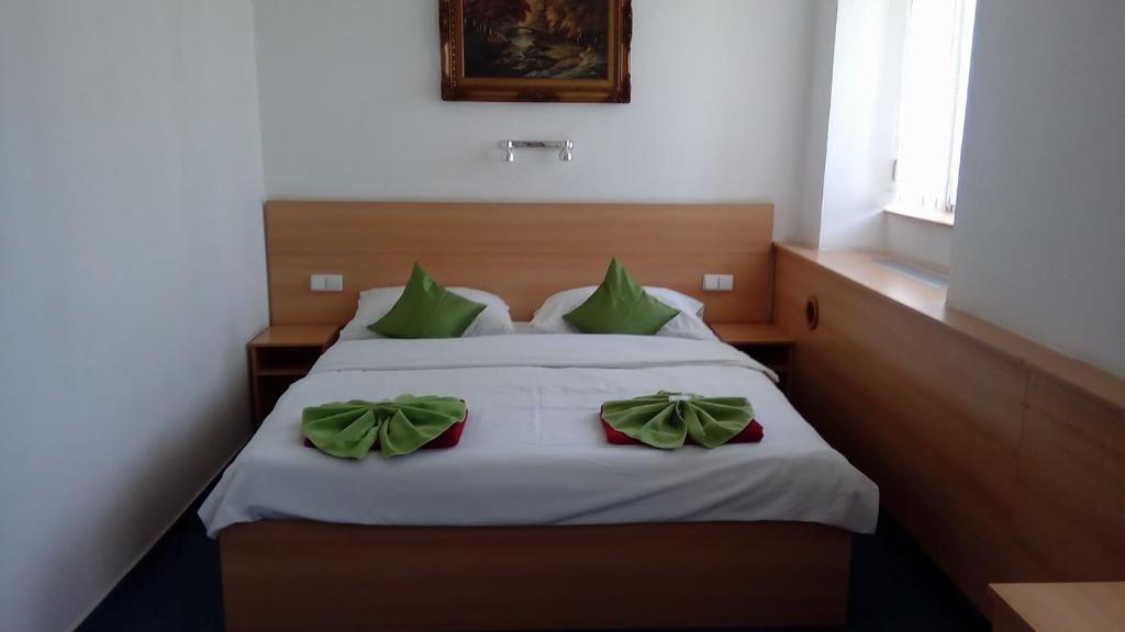 Postel nebo postele na pokoji v ubytování Hotel O.K. 1