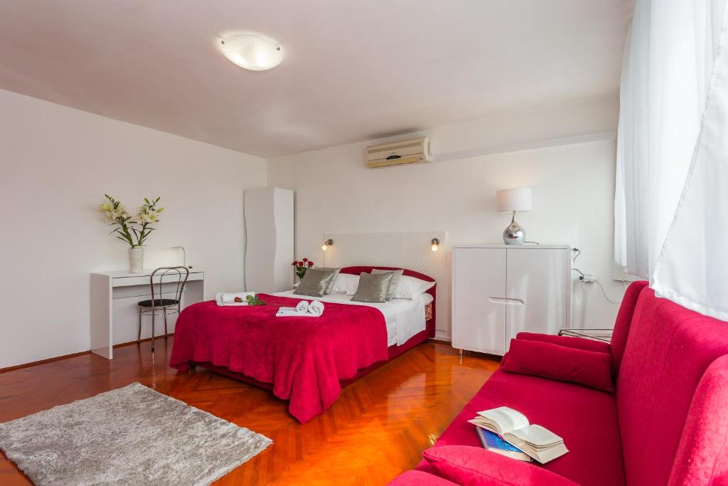 Posteľ alebo postele v izbe v ubytovaní Beach Split Apartments
