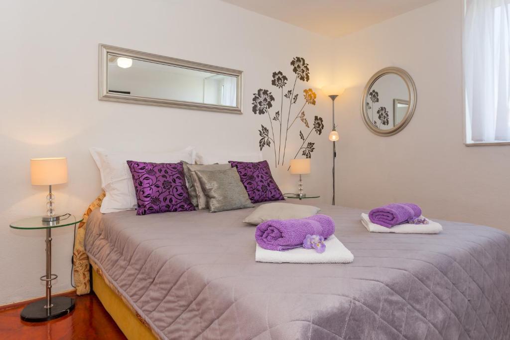 Posteľ alebo postele v izbe v ubytovaní Beach Split Apartments
