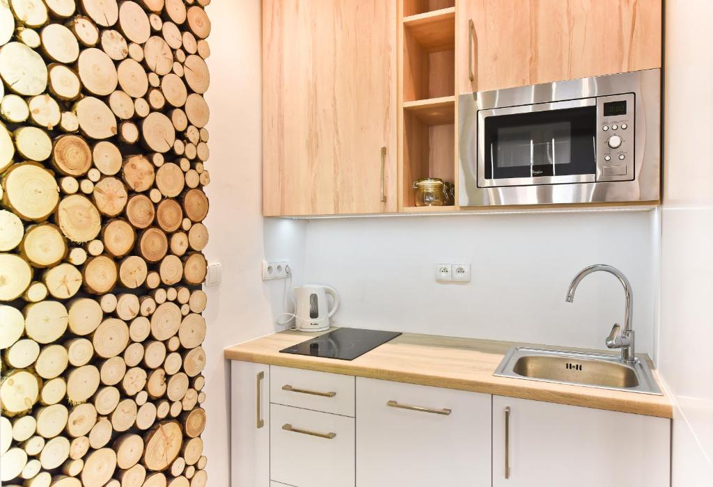 Kuchyňa alebo kuchynka v ubytovaní Apartament Egzotyczny