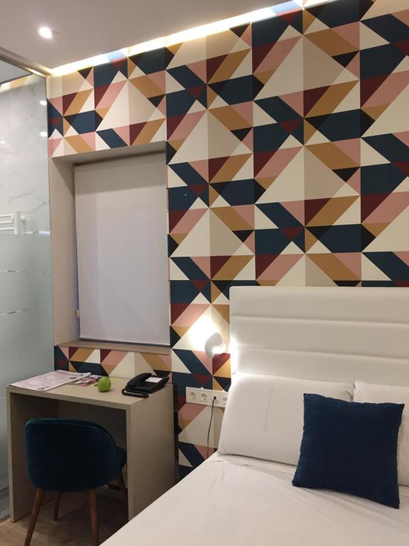 Postel nebo postele na pokoji v ubytování Hotel Artetxe