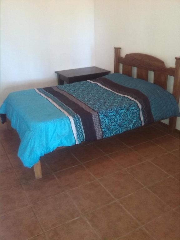 Postel nebo postele na pokoji v ubytování Tiquisia Lodge