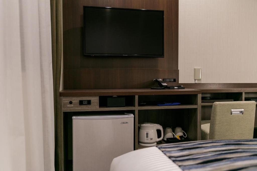 Kuchyň nebo kuchyňský kout v ubytování Hotel Mystays Kagoshima Tenmonkan Annex