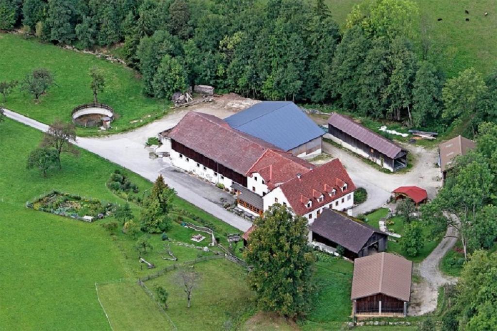 an aerial view of a large house with a barn at Einkehrhof Poggau in Reinsberg