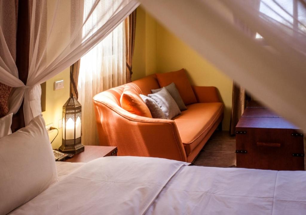 Postel nebo postele na pokoji v ubytování Oasis Hotel