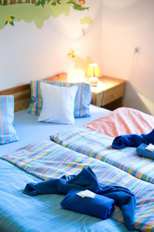 Ein Bett oder Betten in einem Zimmer der Unterkunft Borovansky mlyn