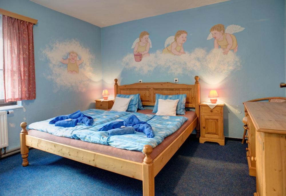 Ein Bett oder Betten in einem Zimmer der Unterkunft Borovansky mlyn
