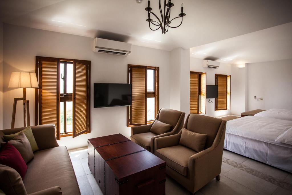 TV a/nebo společenská místnost v ubytování Oasis Hotel