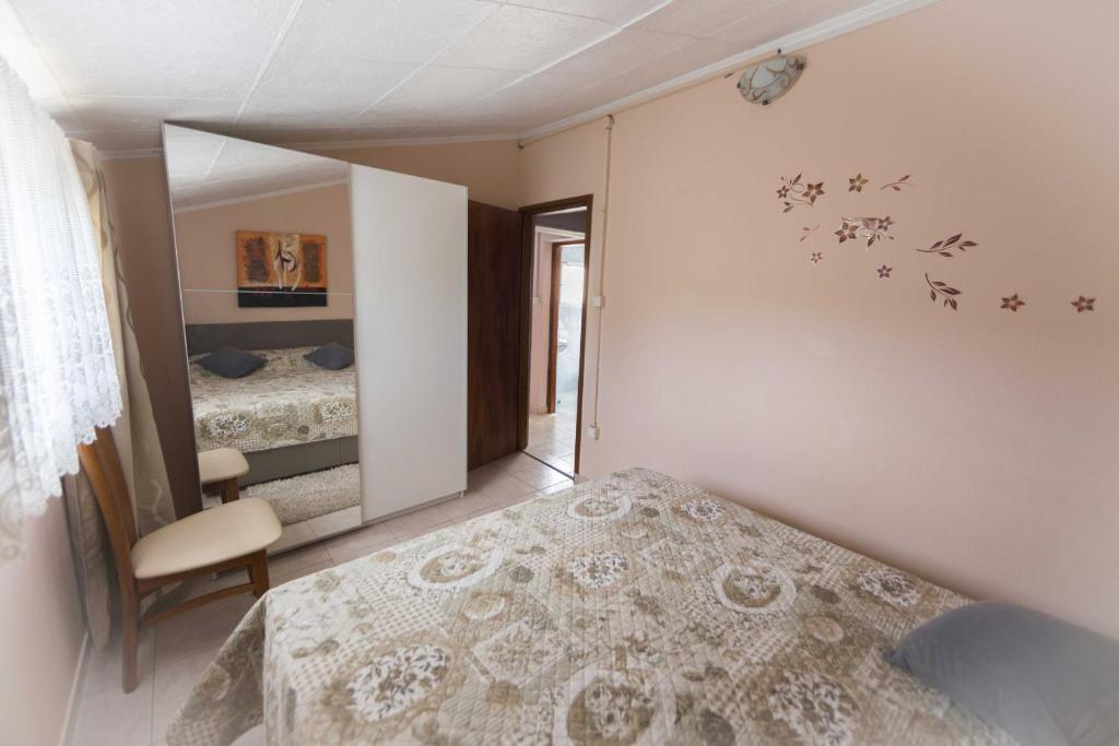 Postel nebo postele na pokoji v ubytování Holiday House Rusticana Sali, Dugi otok near NP Kornati