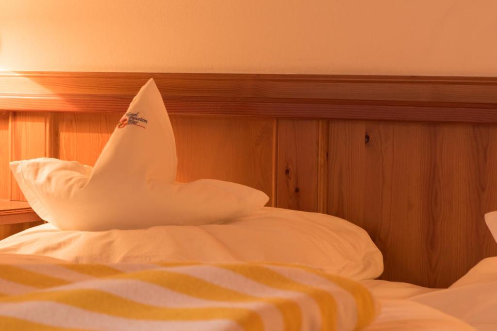 A bed or beds in a room at Villa Rier