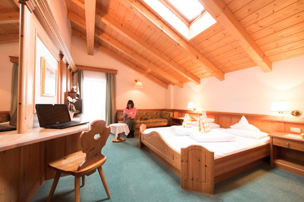A bed or beds in a room at Villa Rier