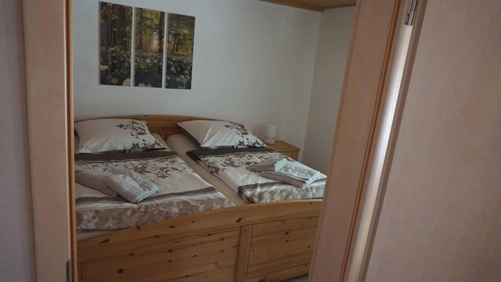 Postel nebo postele na pokoji v ubytování s'Heisl em Woid