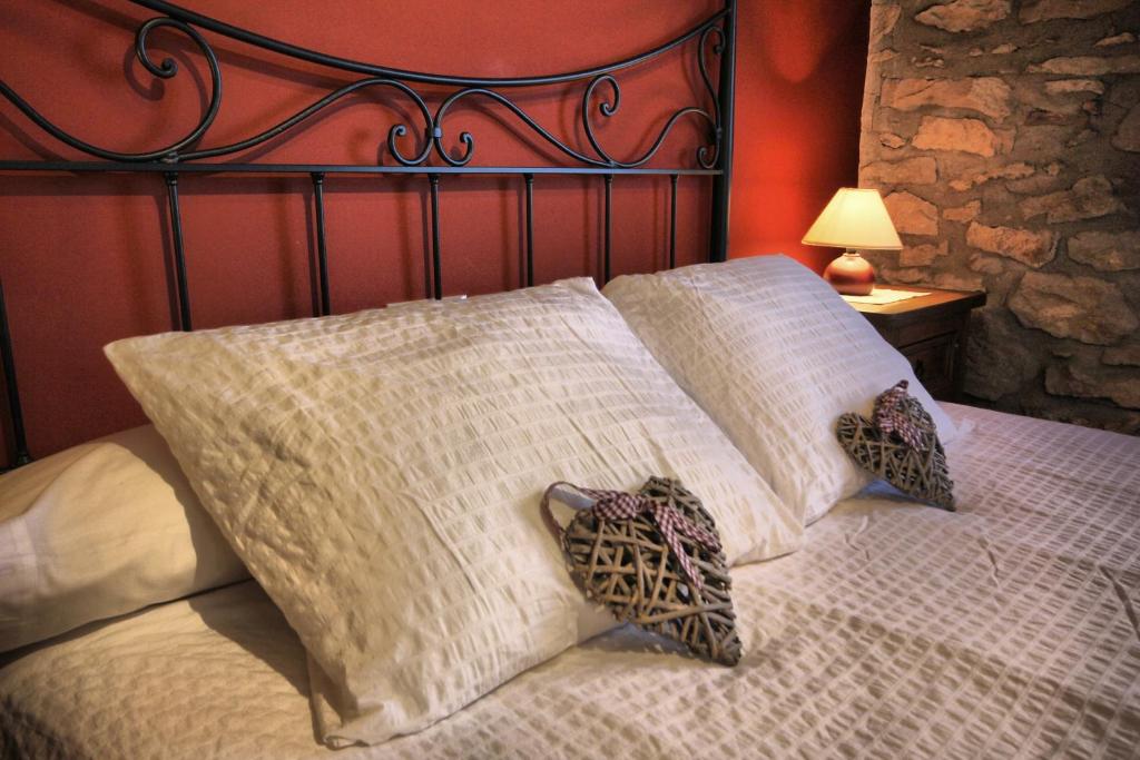 Postel nebo postele na pokoji v ubytování La Casa del Mercat