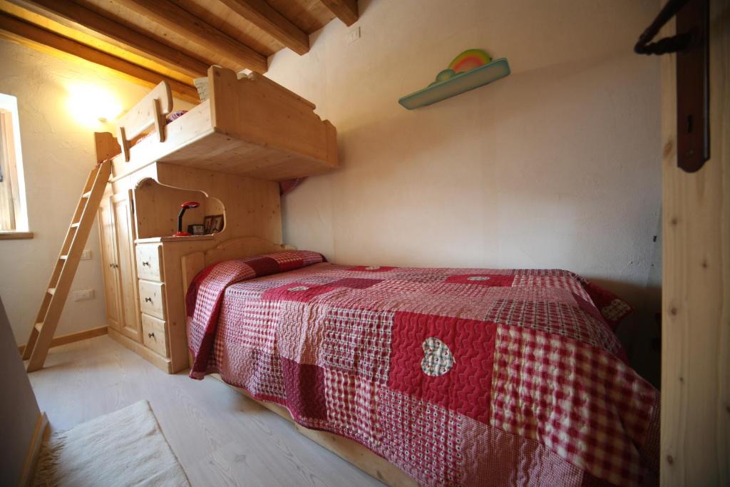 Voodi või voodid majutusasutuse Albergo Diffuso Valcellina e Val Vajont in Casso toas