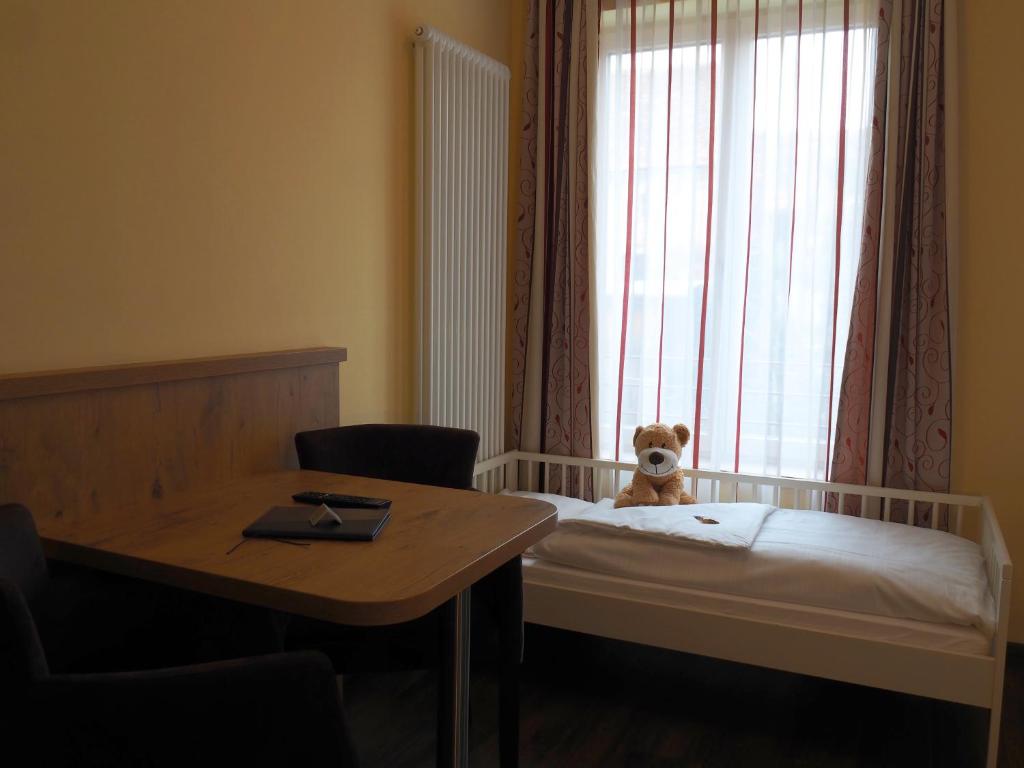 Postel nebo postele na pokoji v ubytování Gasthof Bögl