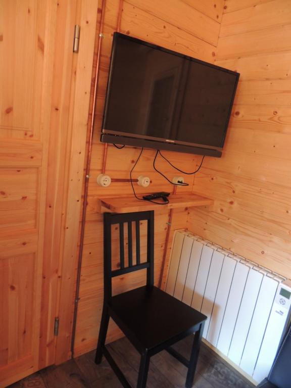 A television and/or entertainment centre at Càmping l'Alguer