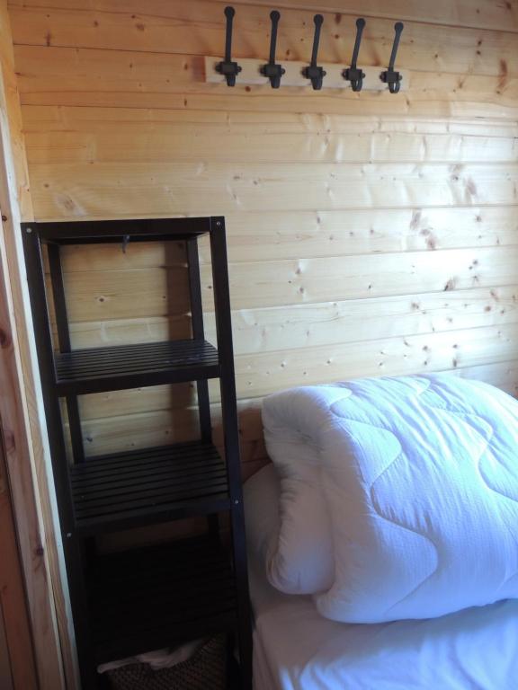 A bed or beds in a room at Càmping l'Alguer