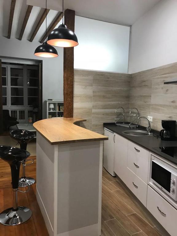 Kuchyňa alebo kuchynka v ubytovaní Casa Condal de Reyna