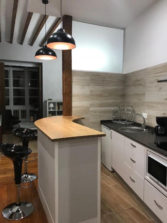 Kuchyňa alebo kuchynka v ubytovaní Casa Condal de Reyna