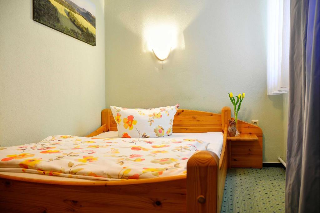 Postel nebo postele na pokoji v ubytování Pension Am Nationalpark