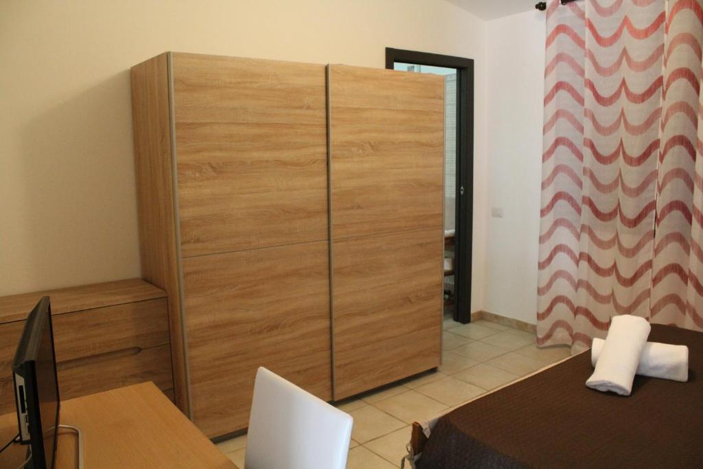 Postel nebo postele na pokoji v ubytování Affittacamere la Medusa