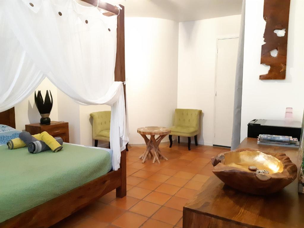 Postel nebo postele na pokoji v ubytování Domaine Choco Vanille