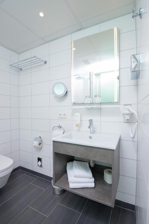 Koupelna v ubytování Stadthotel Freiburg Kolping Hotels & Resorts