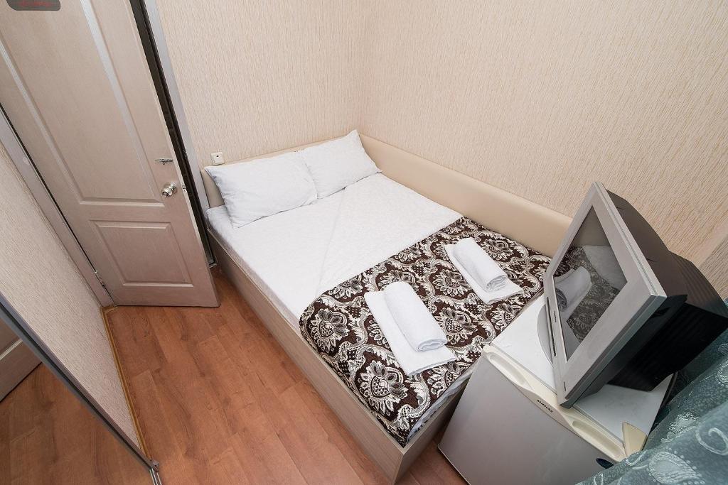 Postel nebo postele na pokoji v ubytování HOTEL ЗiРКА
