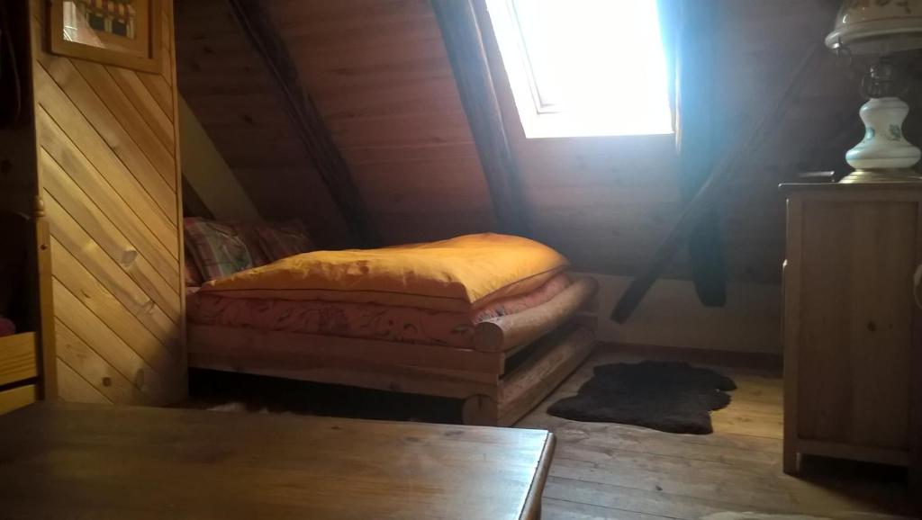 Postel nebo postele na pokoji v ubytování Gite Du Bois De L'ours