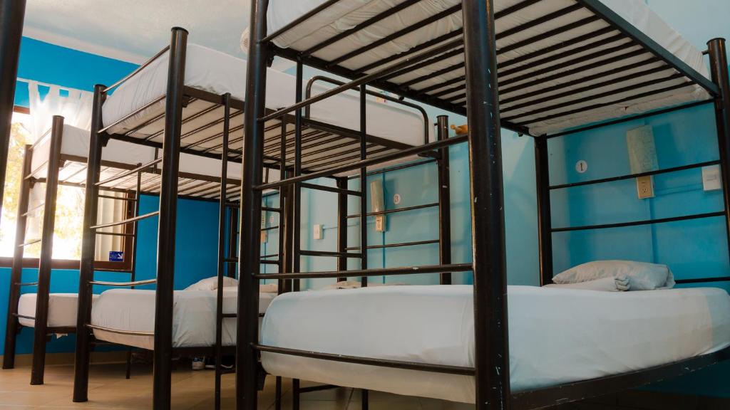 Postel nebo postele na pokoji v ubytování 3B Wellness Hotel & Hostel Adults Only