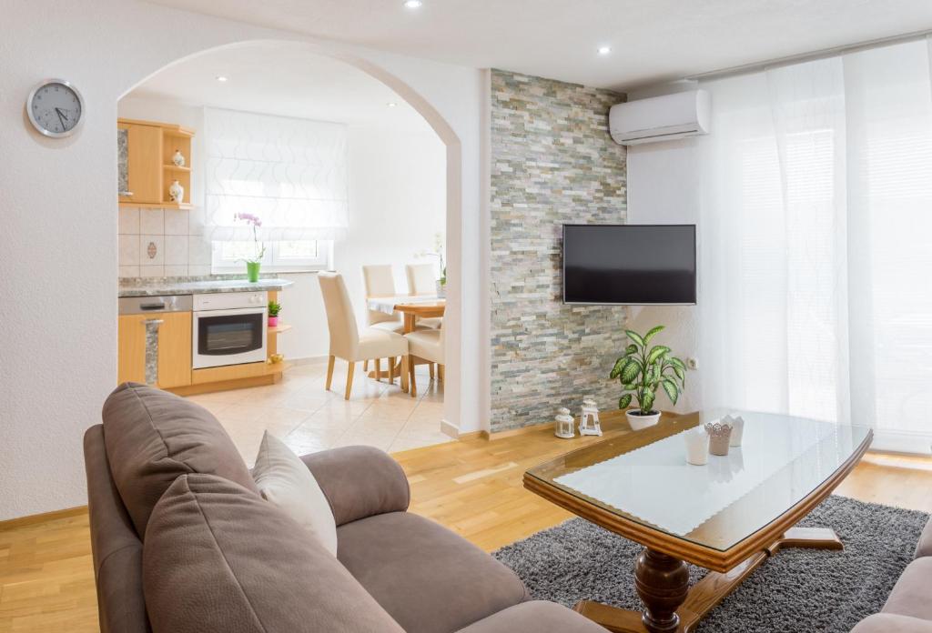 Kuchyň nebo kuchyňský kout v ubytování Apartments Contessa