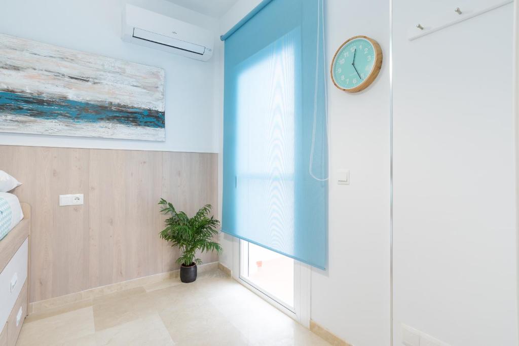 Posteľ alebo postele v izbe v ubytovaní Homemalaga Álamos Luxury